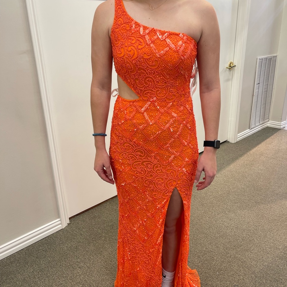 NWT and never worn fully beaded orange prom dress